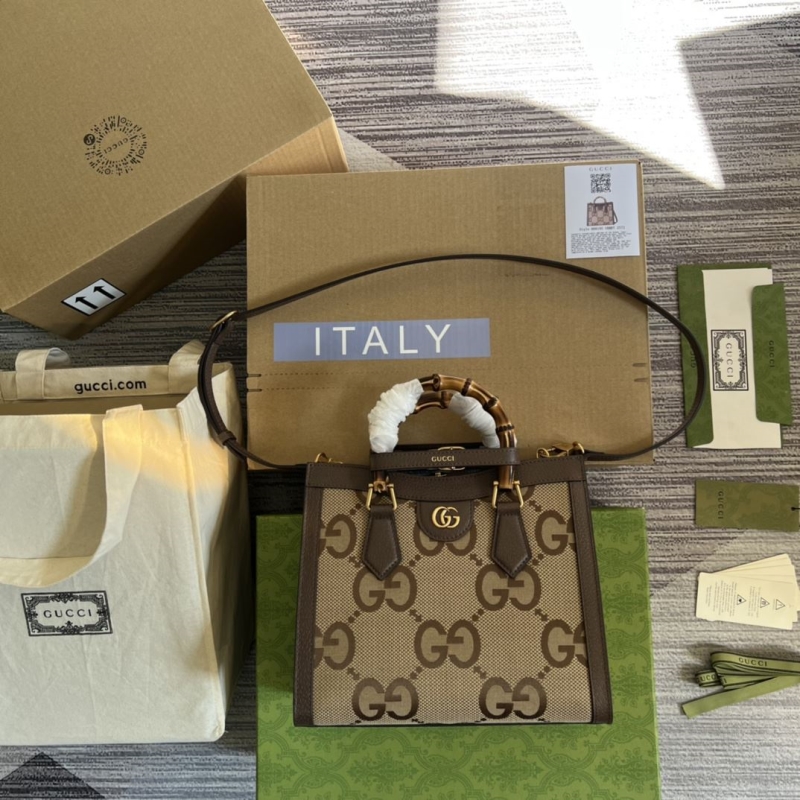 G*u*i shopping bags